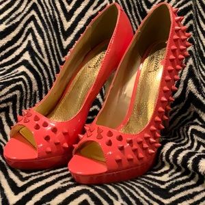 Peach patent leather, cool spike detail, peep toe heels